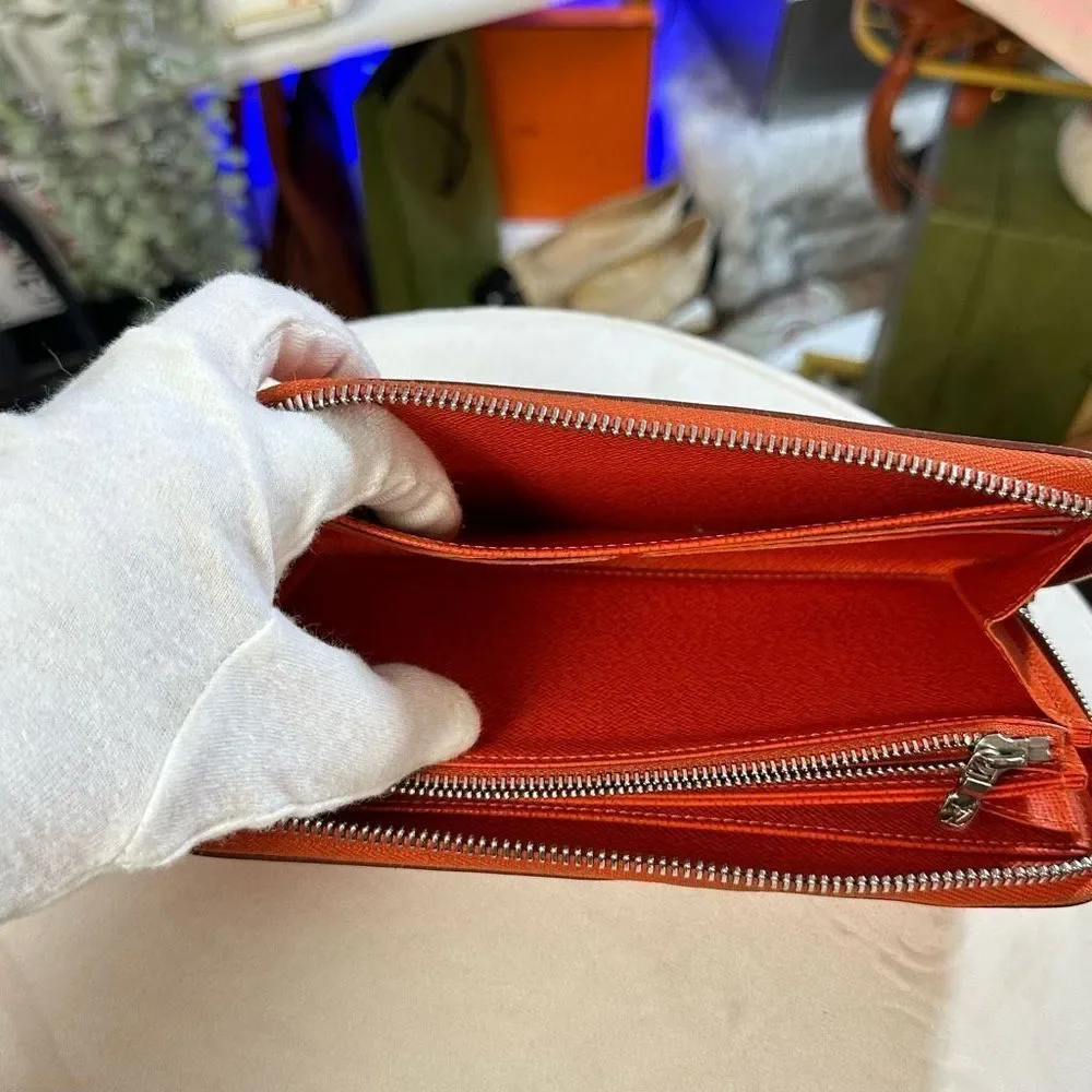 LOUIS VUITTON Long Wallet Epi Zippy Orange Women's Men's Leather